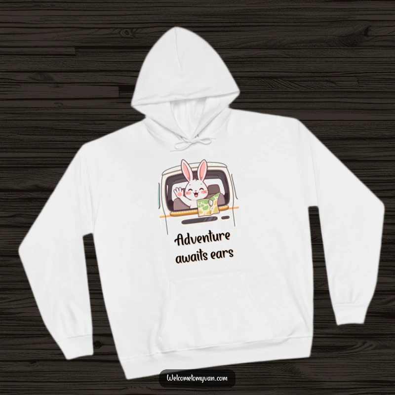 Funny playful bunny waving from a van window, map in paw, featured on a cozy hoodie for adventurers.