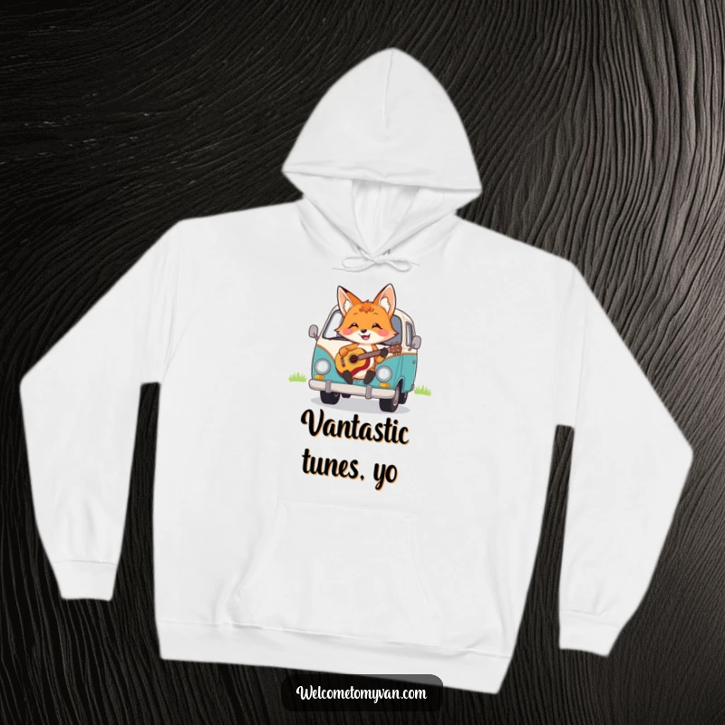 Funny cheerful fox strumming a ukulele on the hood of a van, featured on a cozy hoodie.
